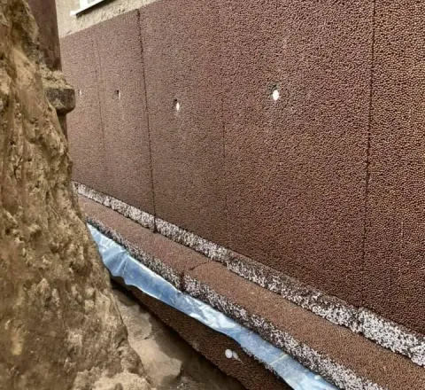 Isolering av källarvägg vid dränering i Uddevalla