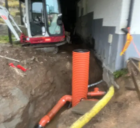 Schakt för dräneringsbrunn vid hus i Uddevalla